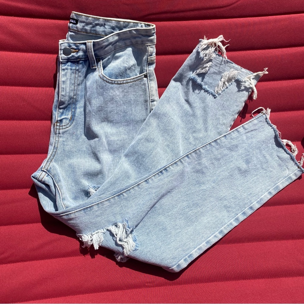 Fashion Nova distressed light washed jeans with raw hem size:9 in juniors